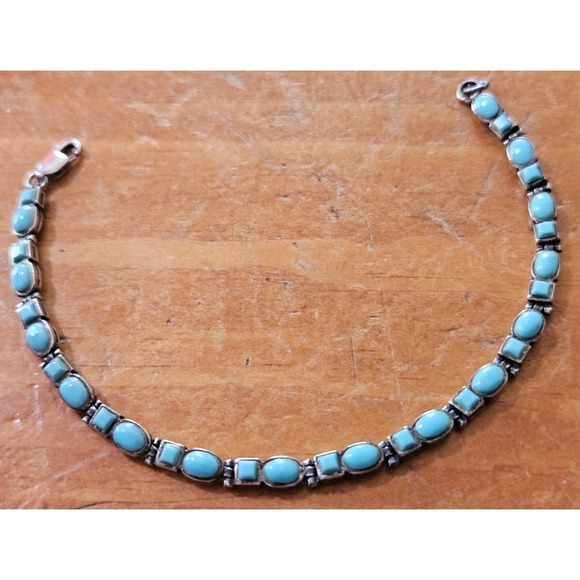 Artisan Jewelry - Natural Sleeping Beauty Turquoise set in a 925 Tennis Bracelet made in AZ